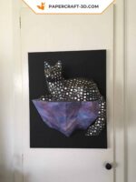 Papercraft chat sur un rocher en 3D