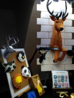 Papercraft de cerf sortant du mur en 3D