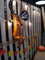 Papercraft de cerf sortant du mur en 3D