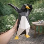 Papercraft de pingouin qui dab en 3D