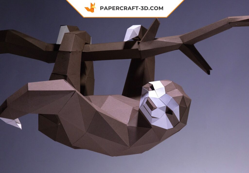 Papercraft paresseux suspendu à sa branche en 3D