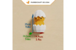 Papercraft poussin dans un œuf en 3D